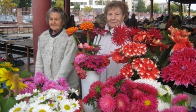 Russian grandmas selling flowers on the streets