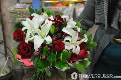 Red roses, lilies and greens delivered to Krasnodar