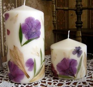 Homemade candles with dried flowers